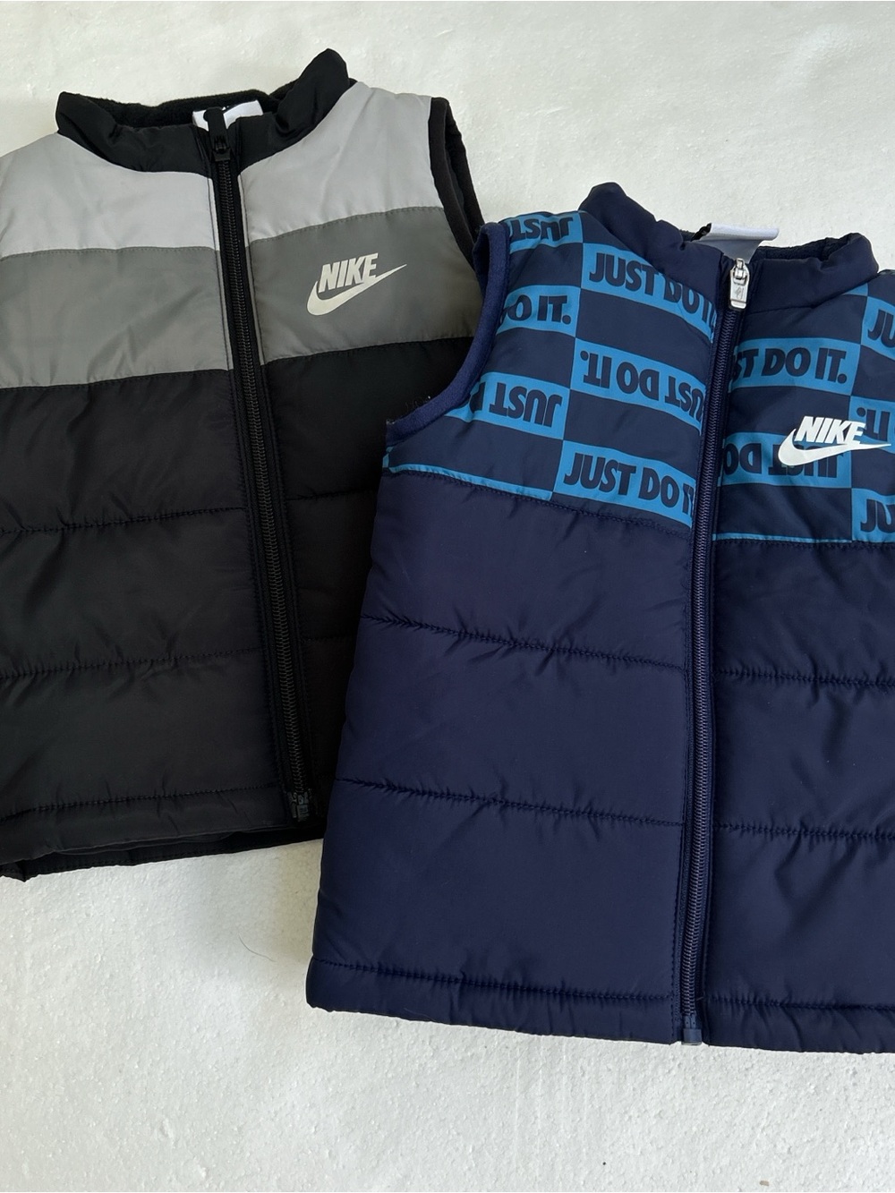 Nike kids toddler boys puffer vests bundle lot twins 
2 vests both size 24 month